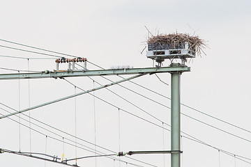 Image showing Stork nest on top of a railroad construction