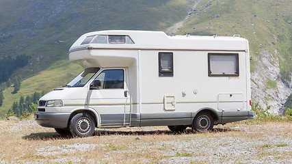 Image showing Camper van parked high in the mountains