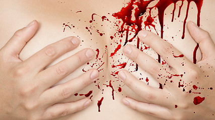 Image showing Hands covering breasts - Blood