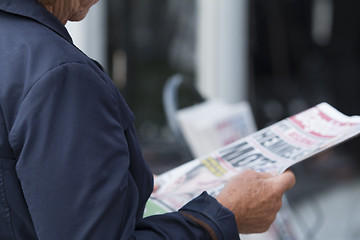 Image showing Newspaper Reader