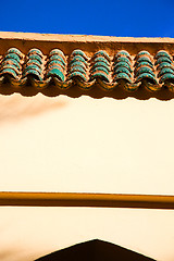 Image showing tile roof  moroccan old wall  