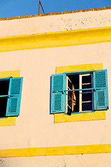 Image showing blue window in morocco  brown wall  construction