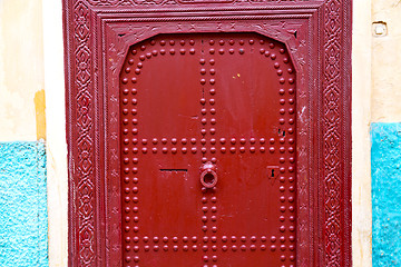 Image showing old door in   ancien and wall ornate blue