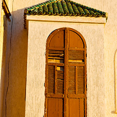 Image showing   yellow window in morocco africa old construction and brown wal