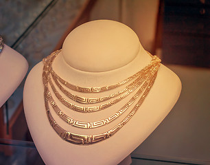 Image showing Beautiful jewelry - gold necklace on the mannequin.