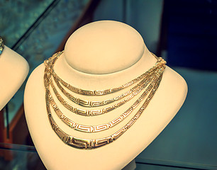 Image showing Beautiful jewelry - gold necklace on the mannequin.