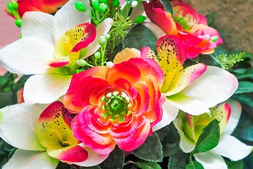 Image showing Small beautiful bouquet of artificial flowers