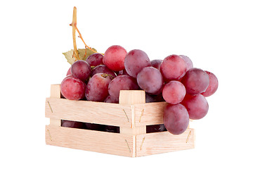 Image showing Red grapes in wooden crate