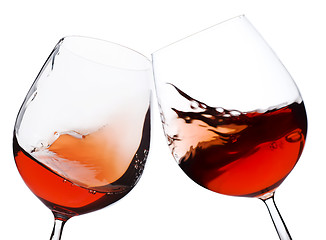 Image showing pair of moving red wine glass