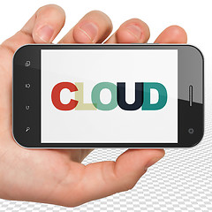 Image showing Cloud networking concept: Hand Holding Smartphone with Cloud on  display