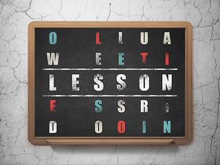 Image showing Education concept: word Lesson in solving Crossword Puzzle