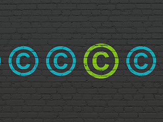 Image showing Law concept: copyright icon on wall background