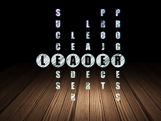 Image showing Finance concept: word Leader in solving Crossword Puzzle