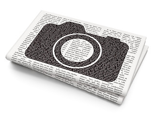 Image showing Travel concept: Photo Camera on Newspaper background