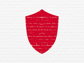 Image showing Protection concept: Shield on wall background