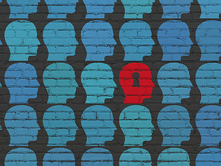 Image showing Education concept: head with keyhole icon on wall background