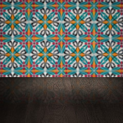 Image showing Wood table top and blur vintage ceramic tile pattern wall