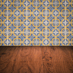 Image showing Wood table top and blur vintage ceramic tile pattern wall