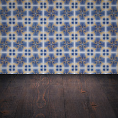 Image showing Wood table top and blur vintage ceramic tile pattern wall