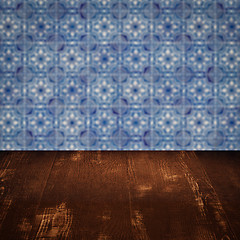 Image showing Wood table top and blur vintage ceramic tile pattern wall