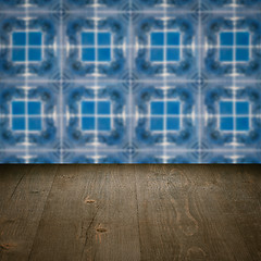 Image showing Wood table top and blur vintage ceramic tile pattern wall