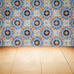 Image showing Wood table top and blur vintage ceramic tile pattern wall