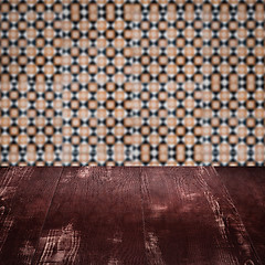 Image showing Wood table top and blur vintage ceramic tile pattern wall