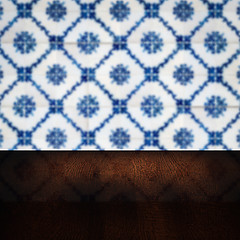 Image showing Wood table top and blur vintage ceramic tile pattern wall