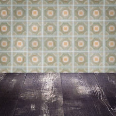 Image showing Wood table top and blur vintage ceramic tile pattern wall