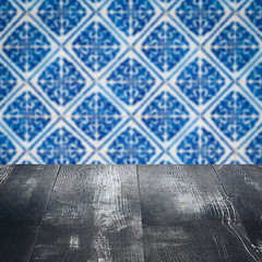 Image showing Wood table top and blur vintage ceramic tile pattern wall