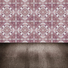 Image showing Wood table top and blur vintage ceramic tile pattern wall