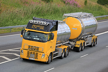 Image showing Yellow Volvo FH Tank Truck Transports Food on Motorway