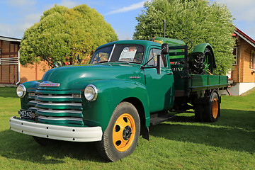Image showing Nostalgic Chevrolet 6400 Pickup Truck and Classic Tractor