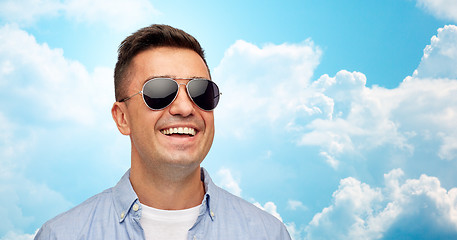 Image showing face of smiling man in shirt and sunglasses