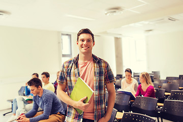 Image showing group of smiling students in lecture hall