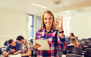 Image showing group of smiling students with tablet pc