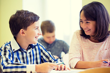 Image showing group of school kids writing test in classroom