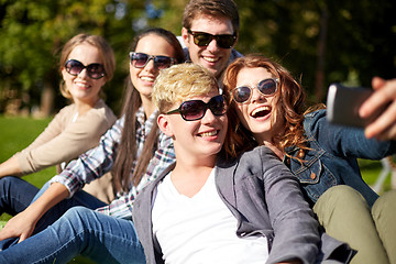 Image showing students or teenagers with smartphone at campus