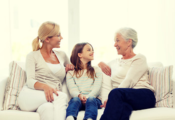 Image showing smiling family at home