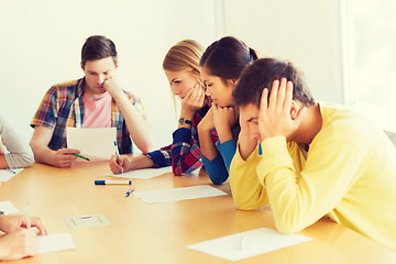 Image showing group of students with papers