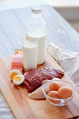 Image showing close up of natural protein food on wooden table