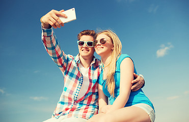 Image showing smiling couple having fun outdoors