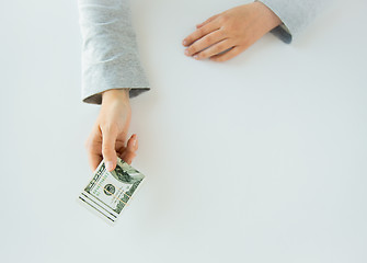 Image showing close up of woman hands holding us dollar money