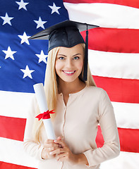Image showing student in graduation cap with certificate