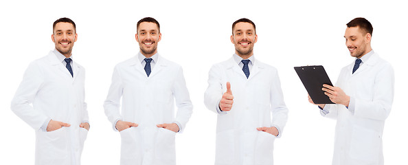 Image showing happy doctors with clipboard showing thumbs up