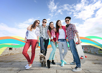 Image showing teenagers with skates outside