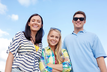 Image showing group of happy friends on beach