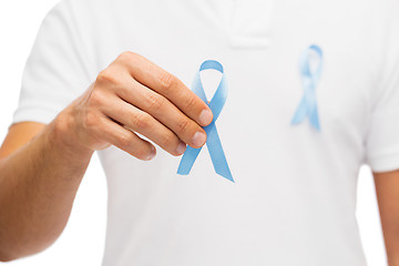 Image showing hand with blue prostate cancer awareness ribbon