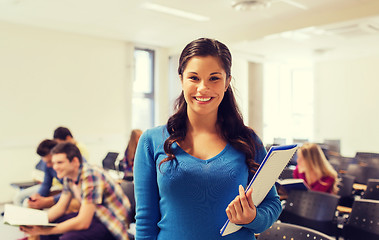 Image showing group of smiling students in lecture hall