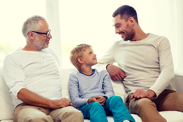 Image showing smiling family at home